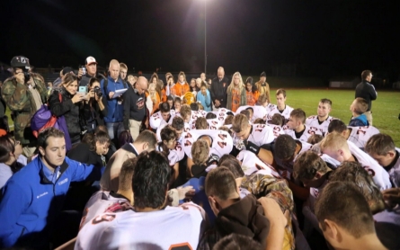 Praying after football games gets high school coach in trouble